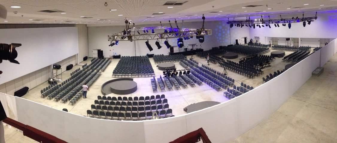 comparativo de custos logística de eventos Bahia vs equipe de fora Sanches Produções