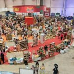 Stands de alta complexidade e cenografia para eventos corporativos premium executados pela Sanches Produções